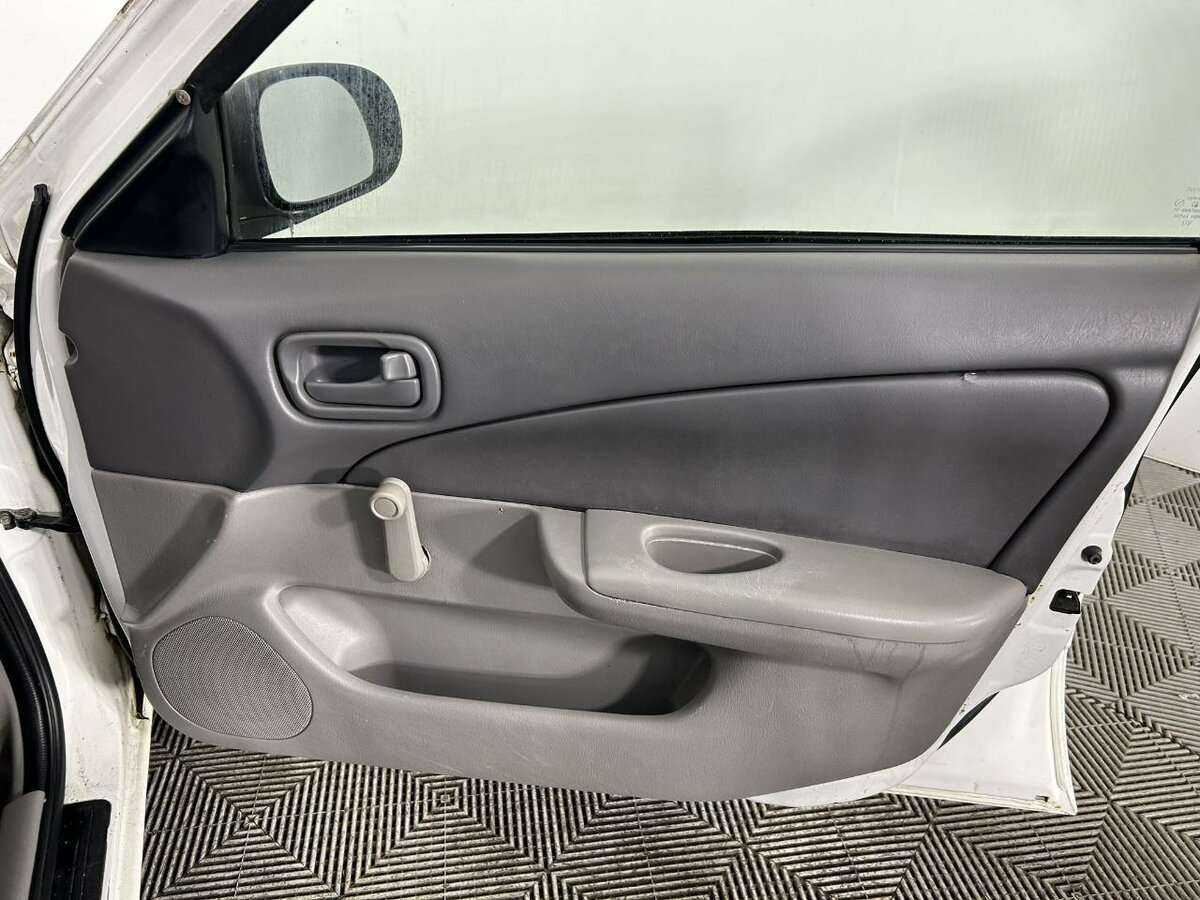 Nissan Sunny, 2004 Фото №8
