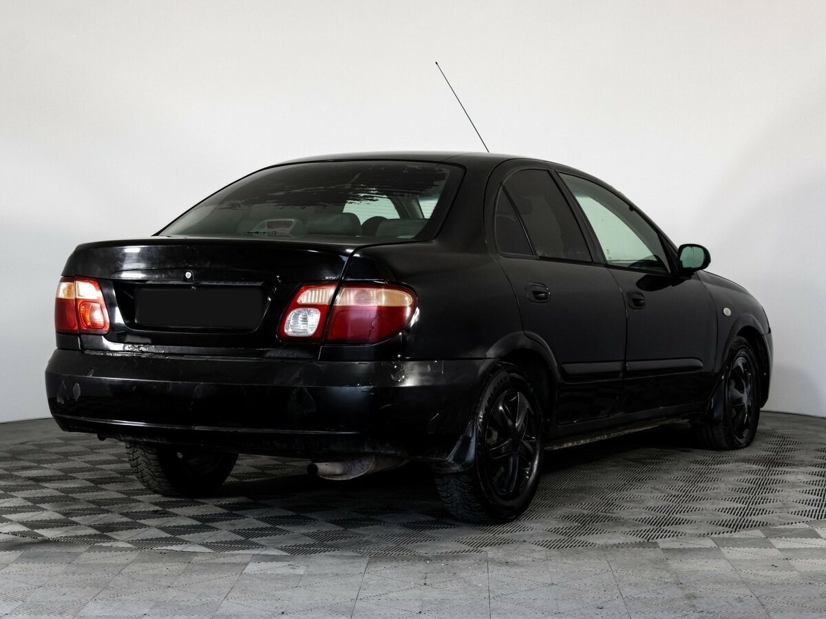 Nissan Almera II (N16) Рестайлинг, 2005 Фото №4