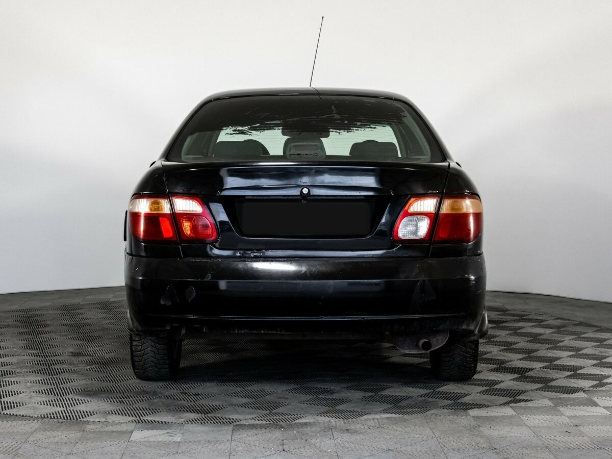 Nissan Almera II (N16) Рестайлинг, 2005 Фото №5
