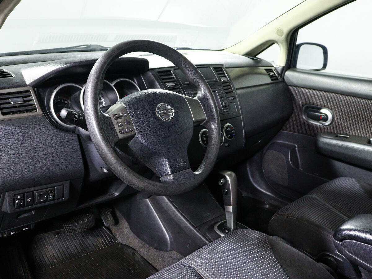Nissan Tiida, 2011 Фото №14