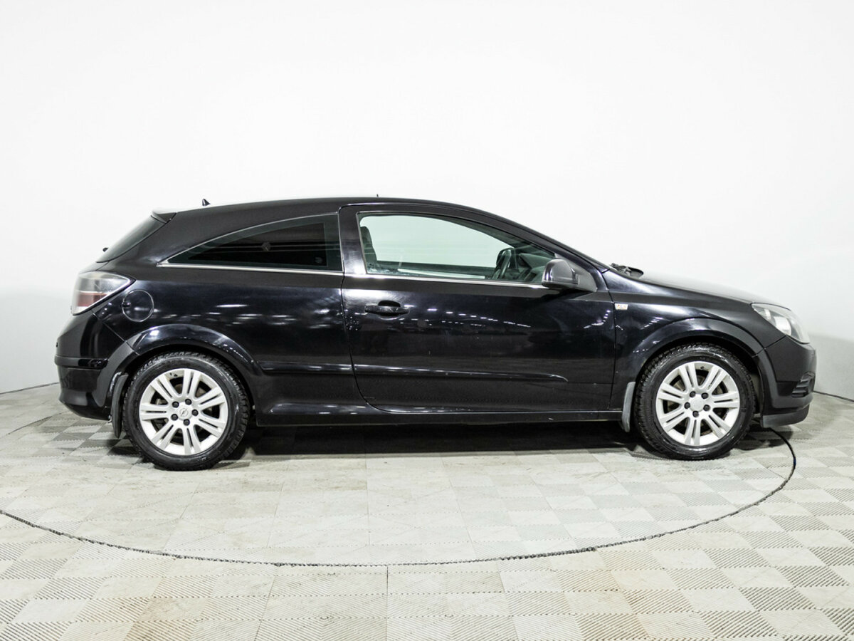 Opel Astra GTC H Рестайлинг, 2010 Фото №4