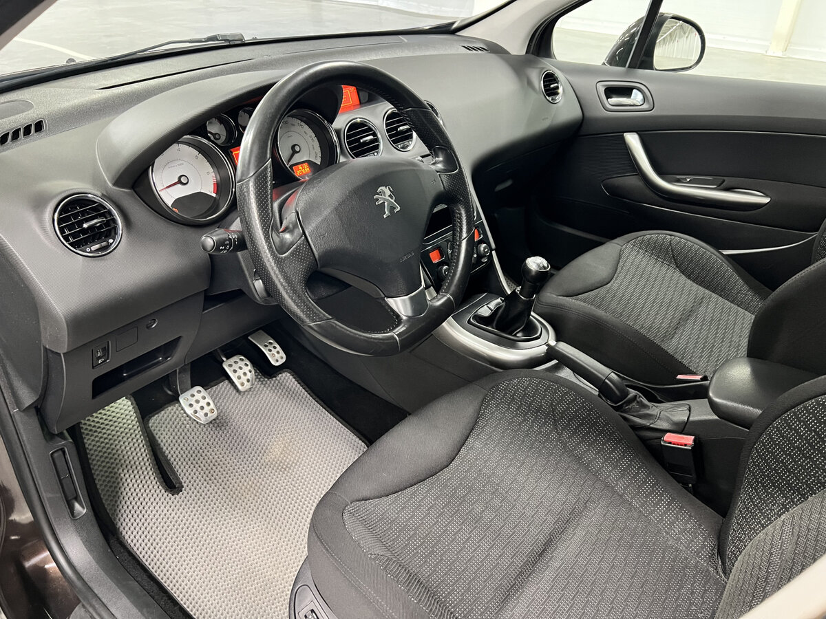 Peugeot 308 I Рестайлинг, 2012 Фото №13