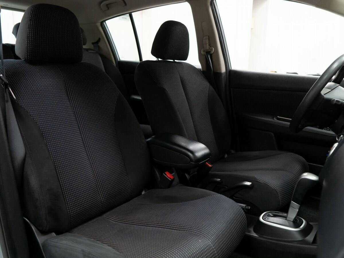Nissan Tiida, 2011 Фото №12