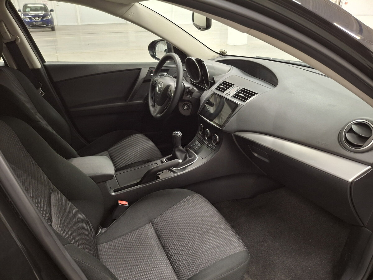 Mazda 3 II (BL) Рестайлинг, 2013 Фото №11
