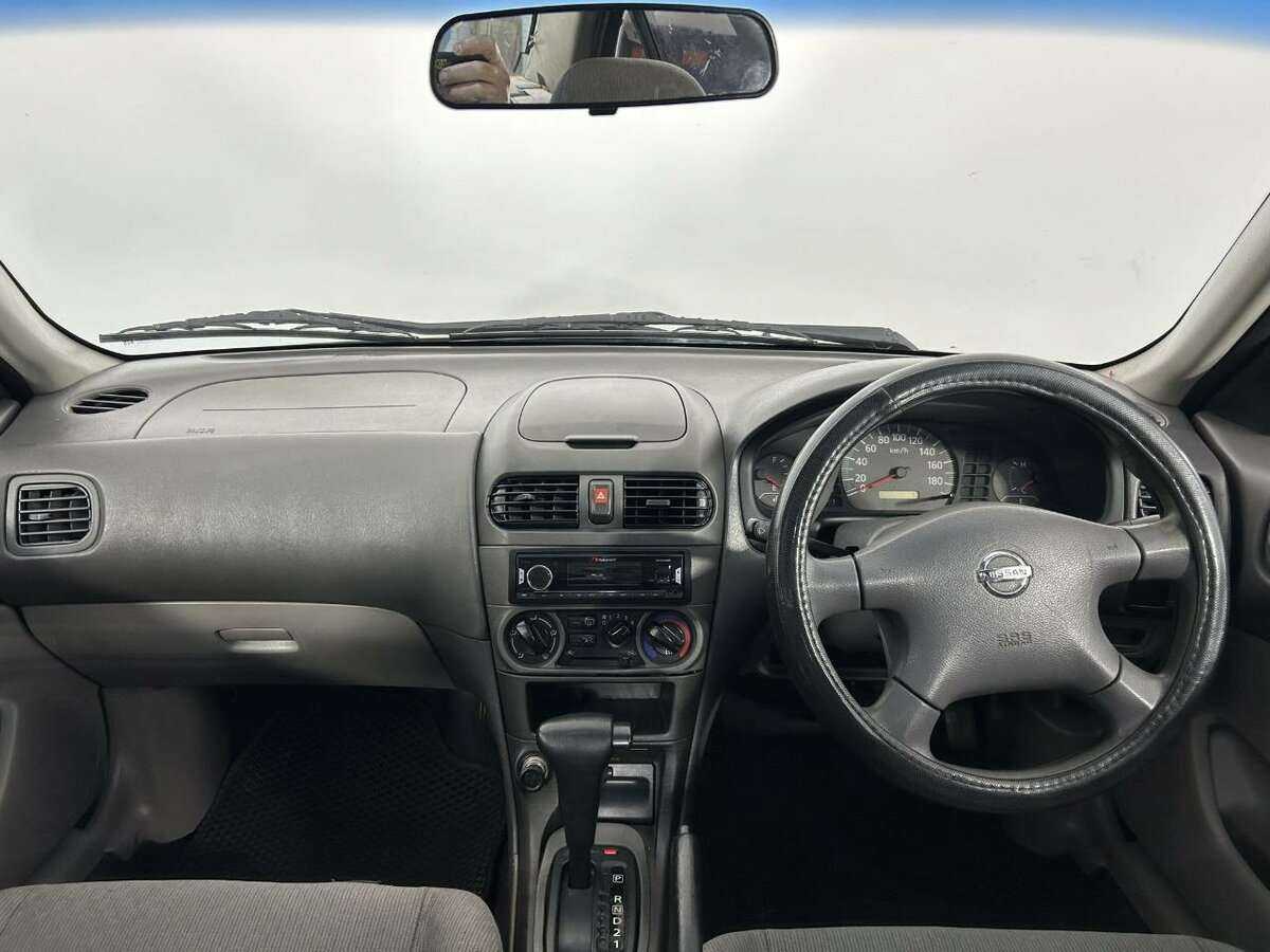 Nissan Sunny, 2004 Фото №7
