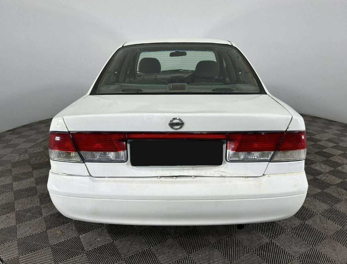Nissan Sunny, 2004 Фото №3
