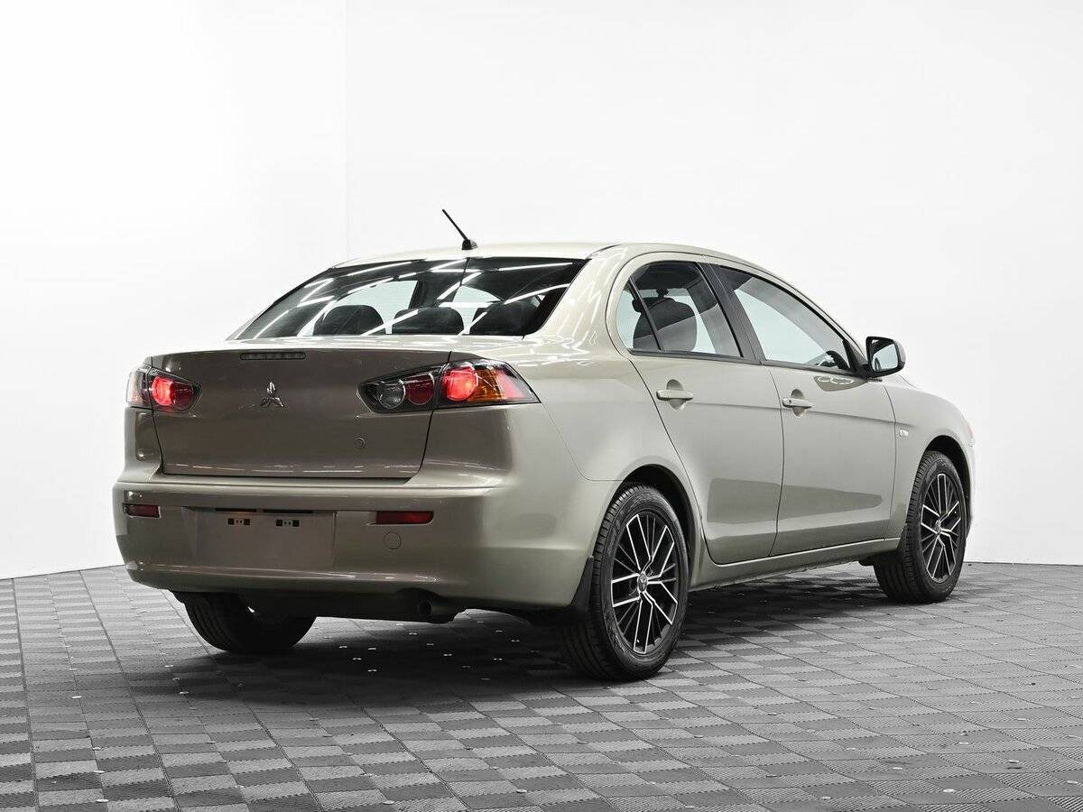 Mitsubishi Lancer, 2010 Фото №4