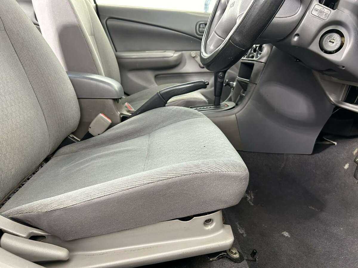 Nissan Sunny, 2004 Фото №10