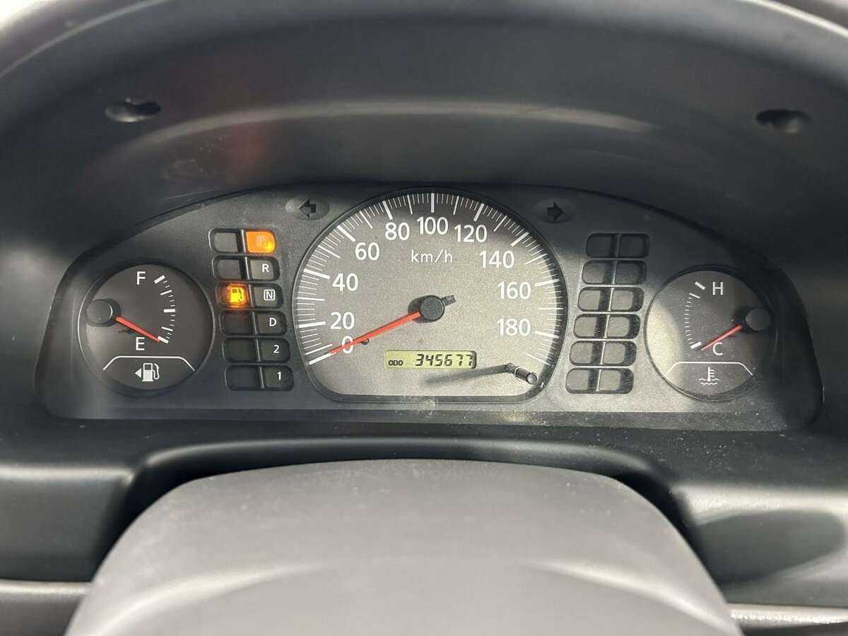 Nissan Sunny, 2004 Фото №11