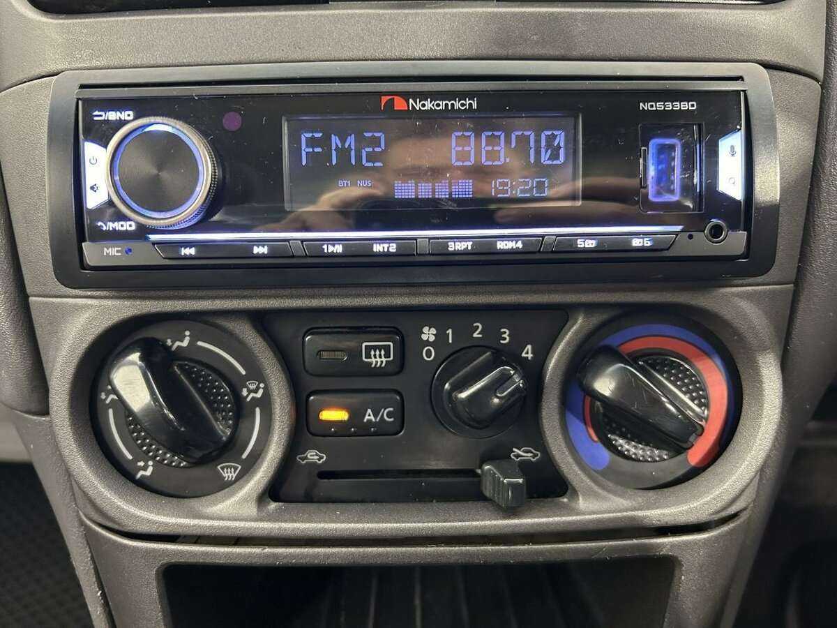 Nissan Sunny, 2004 Фото №12