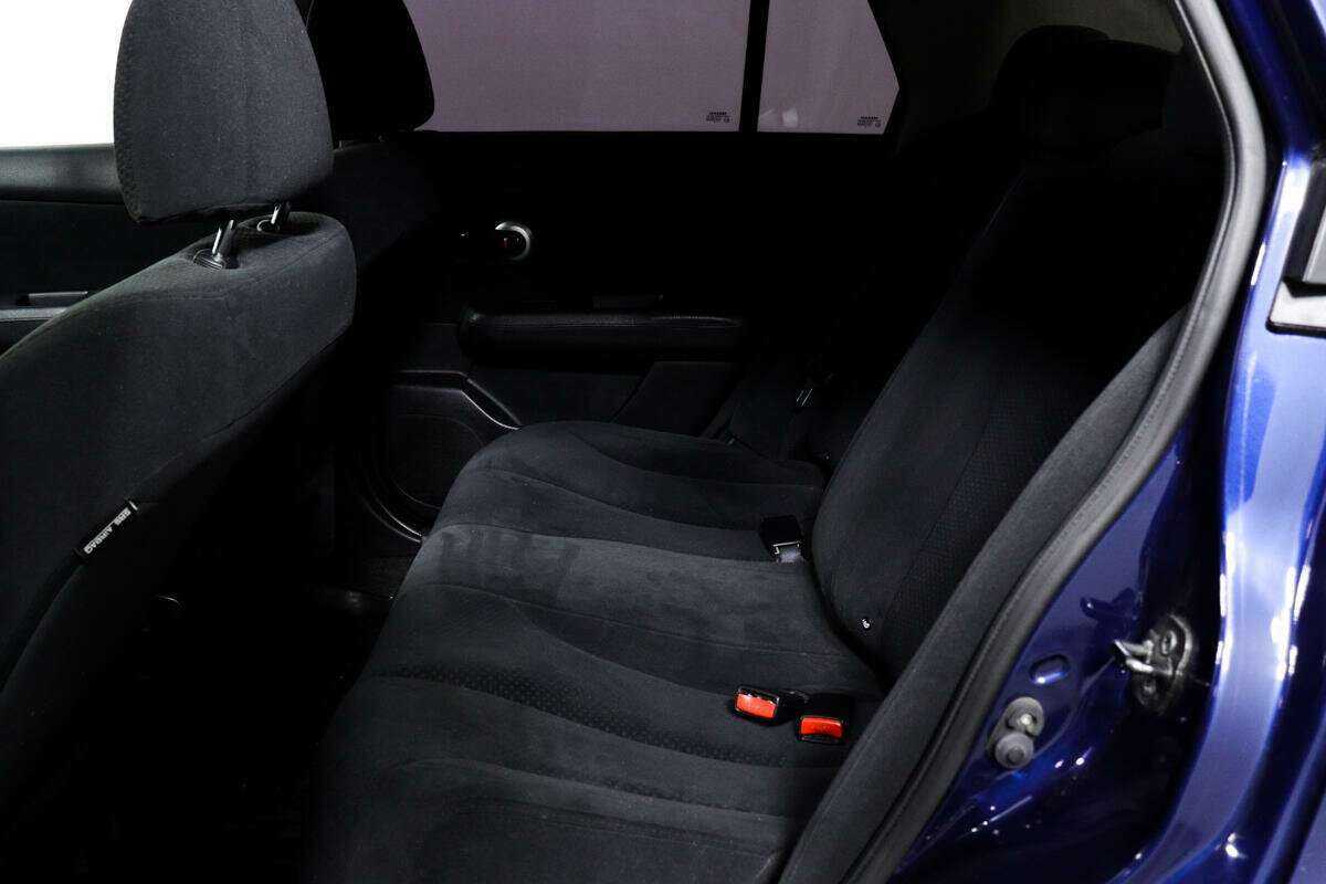 Nissan Tiida, 2010 Фото №12