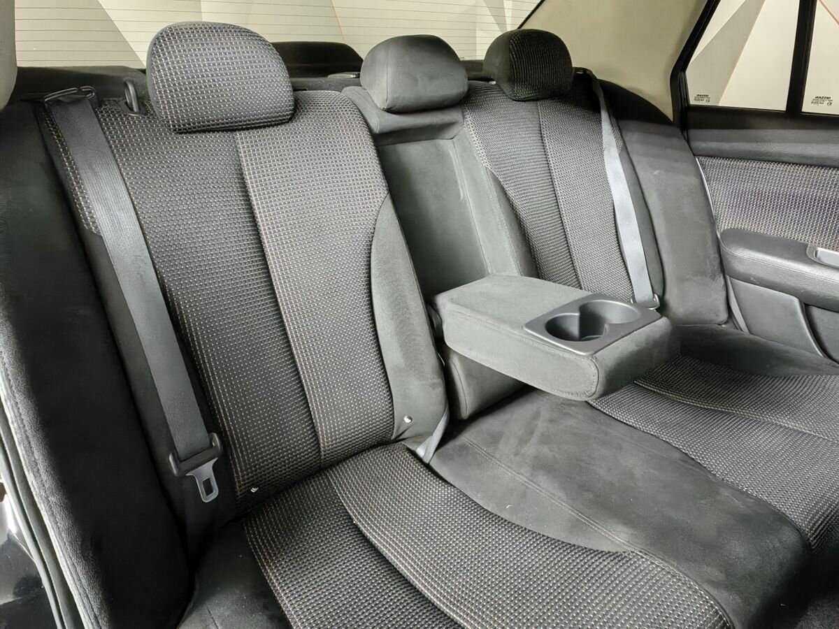 Nissan Tiida, 2010 Фото №13