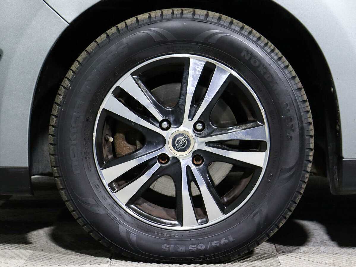 Nissan Tiida, 2010 Фото №13