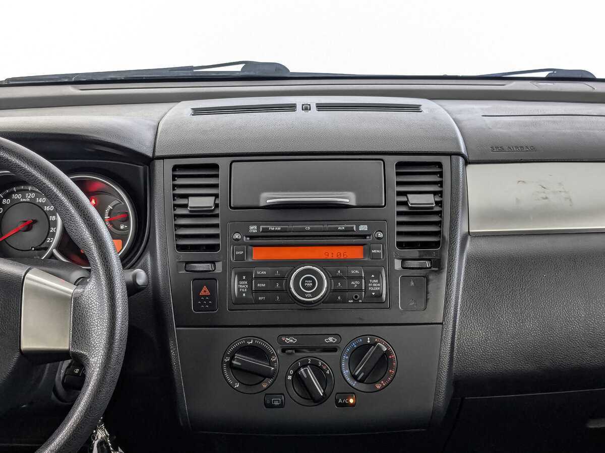 Nissan Tiida, 2011 Фото №13