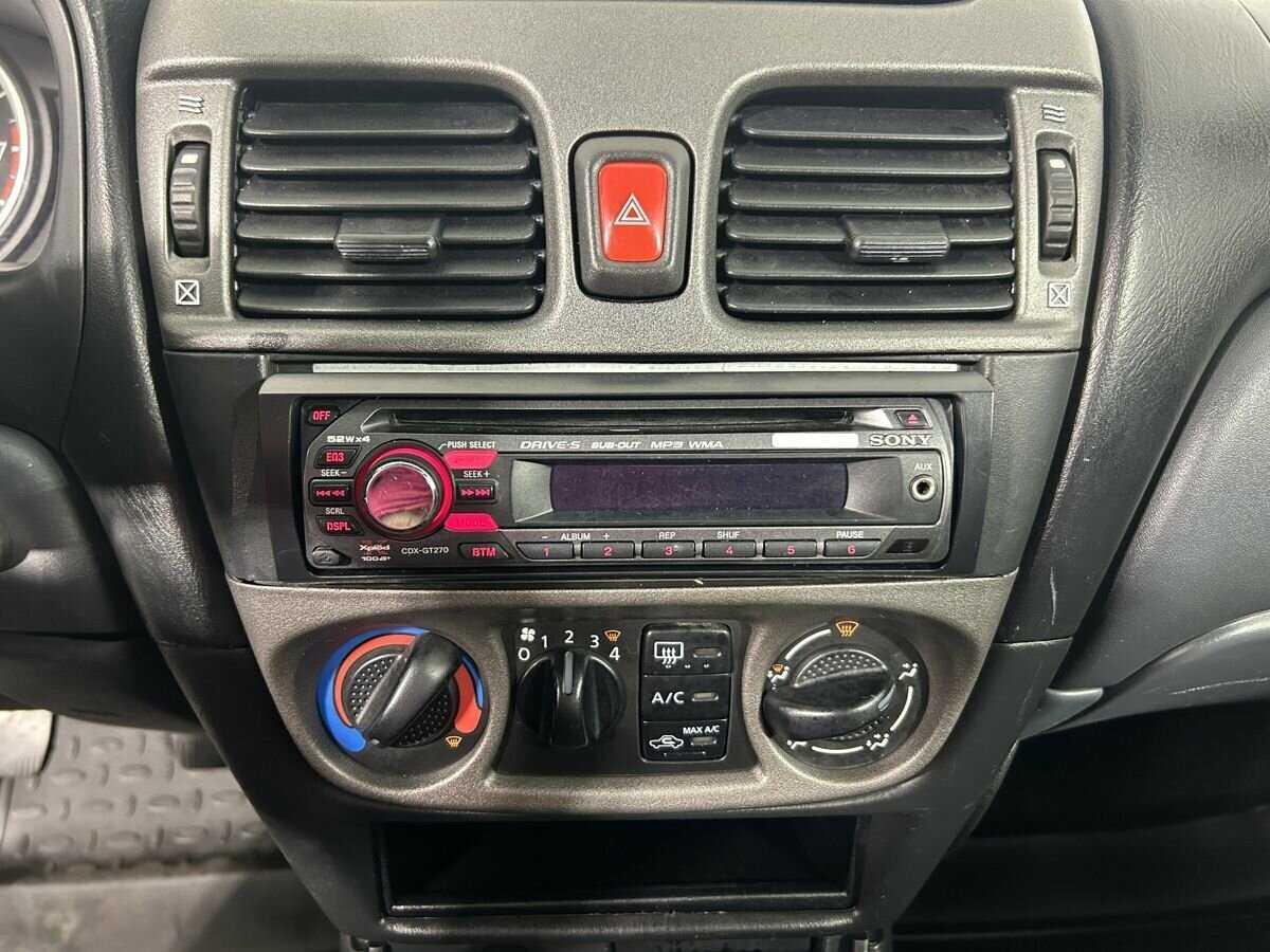 Nissan Almera, 2005 Фото №12