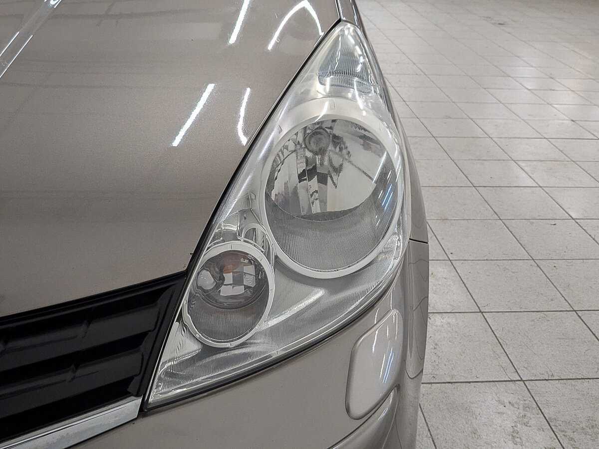 Nissan Note, 2011 Фото №11