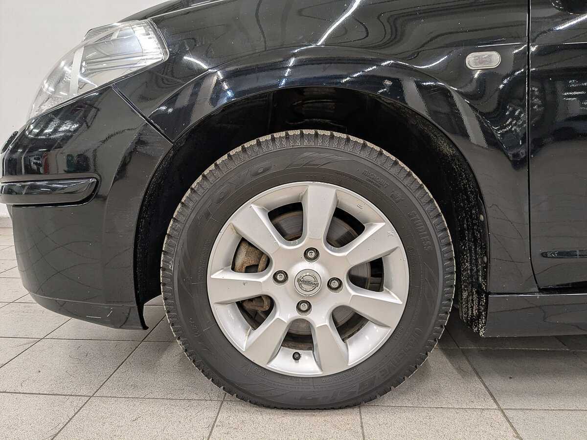 Nissan Tiida, 2010 Фото №12