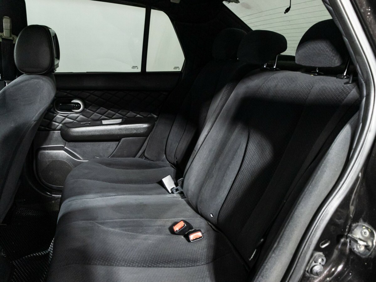 Nissan Tiida I Рестайлинг, 2010 Фото №10