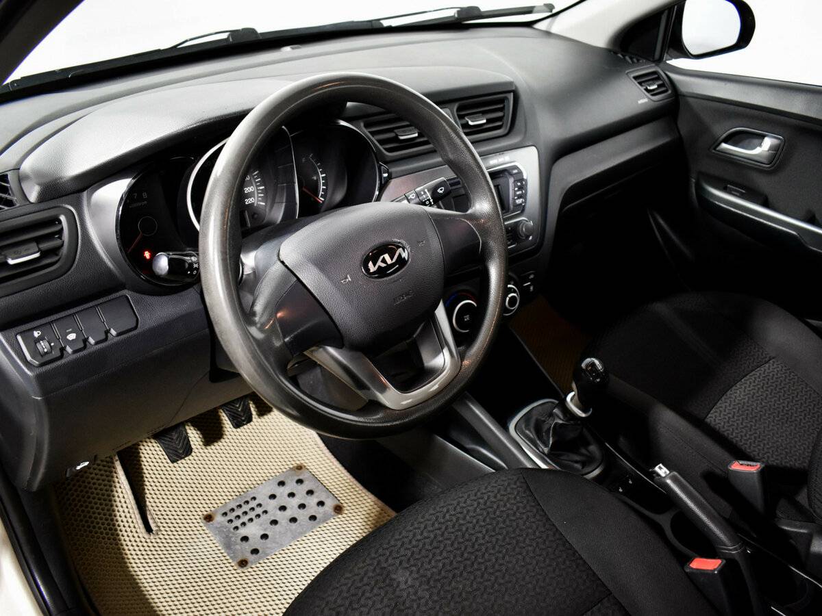Kia Rio 5-speed III, 2011 Фото №9