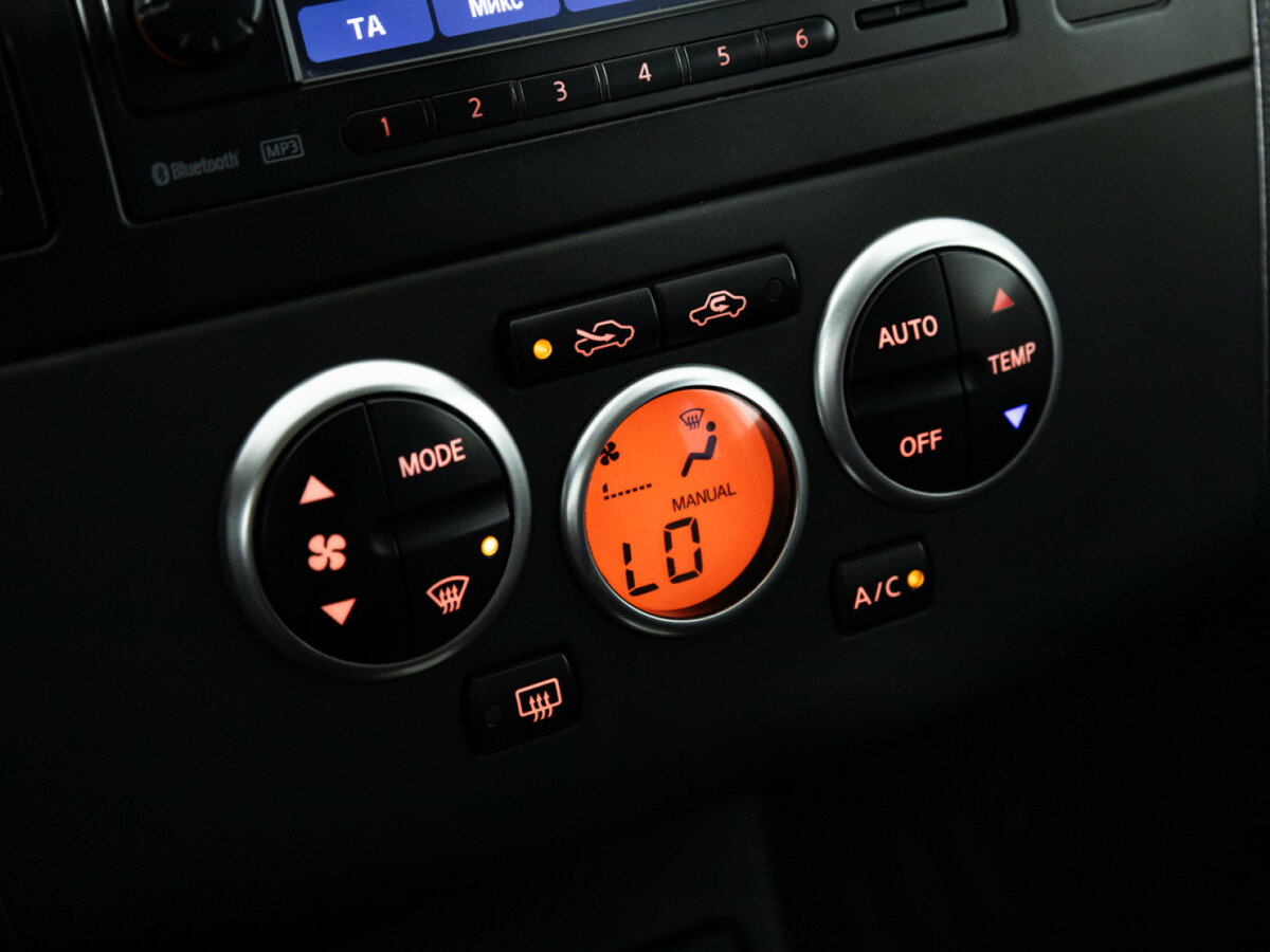 Nissan Tiida I Рестайлинг, 2010 Фото №17