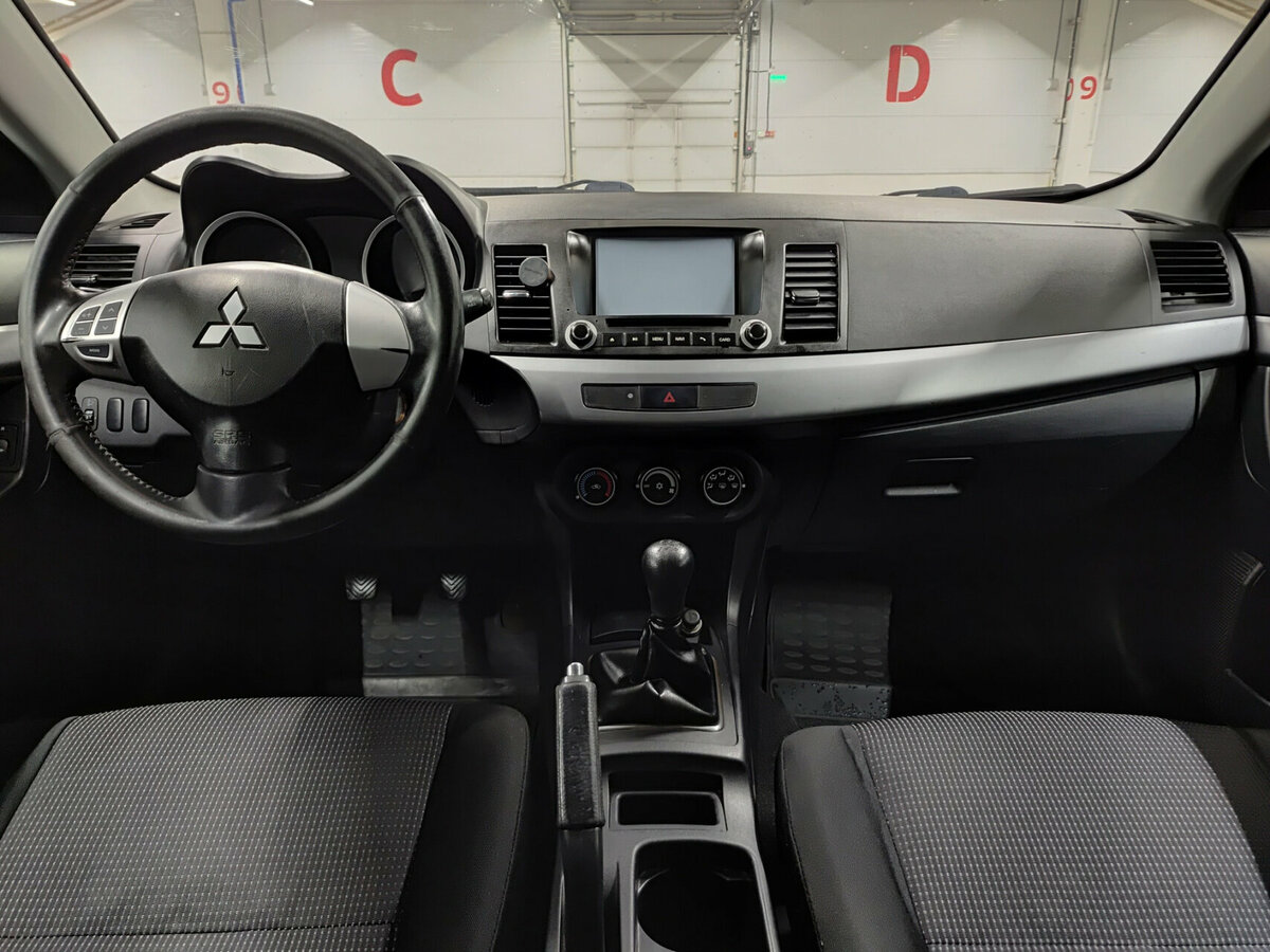 Mitsubishi Lancer X Рестайлинг, 2011 Фото №14